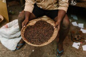 Man selling ethically produced coffee beans